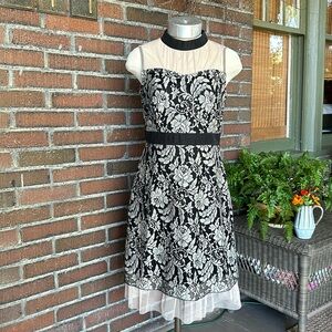 Young Essence sleeveless black floral lace overlay dress w/sheer tulle trim.Sz S